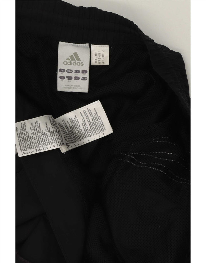Adidas ženske trenirke otporne na klimatske uvjete UK 12 Srednje crni poliester