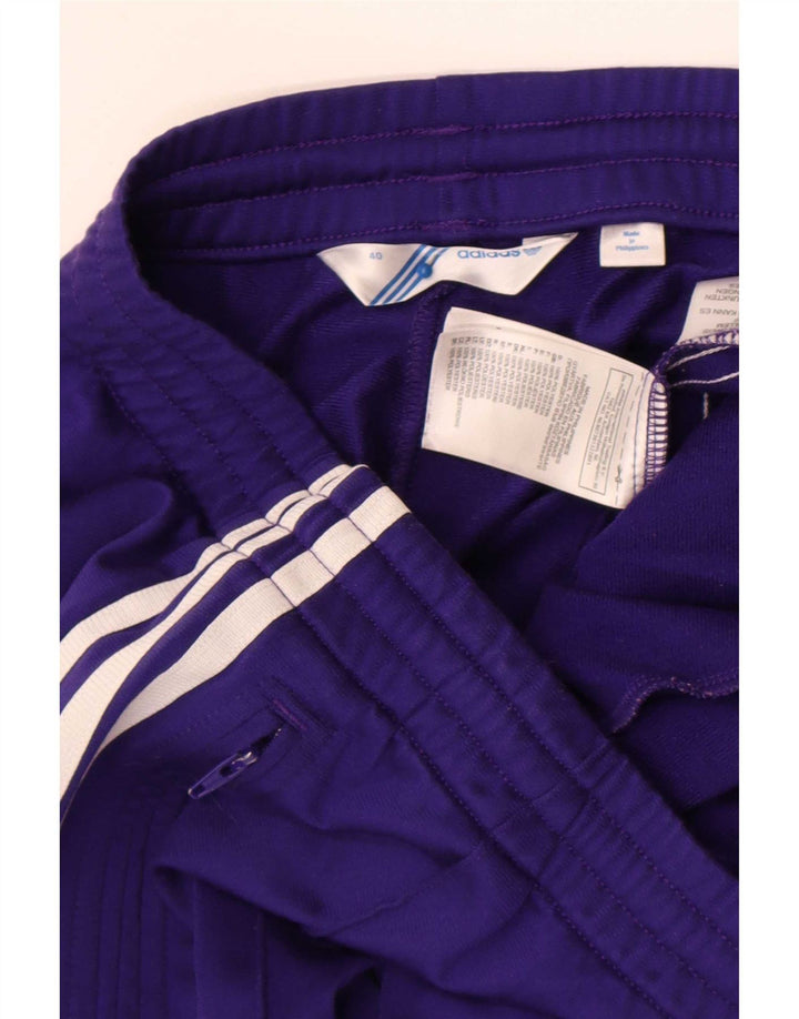 Adidas ženske hlače za trenirku EU 40 srednje ljubičaste poliesterske boje