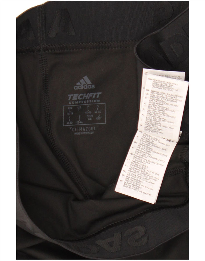 Adidas ženske Tech Fit Capri tajice UK 16/18 velike crne poliesterske