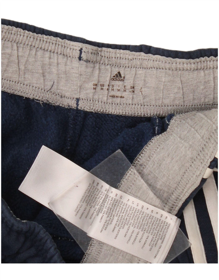 Adidas ženske hlače za trenirku s grafičkim motivima Joggers UK 14 srednje tamnoplave