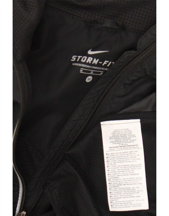 Nike ženska gornja jakna trenirke Storm-Fit UK 12 srednji crni poliester