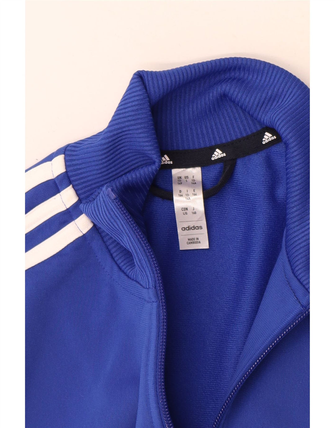 Adidas trenirka za dječake 13-14 godina plava poliesterska boja