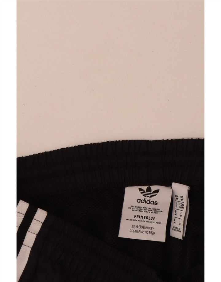 Adidas muške trenirke s grafičkim motivima, srednje jakne, crni poliester