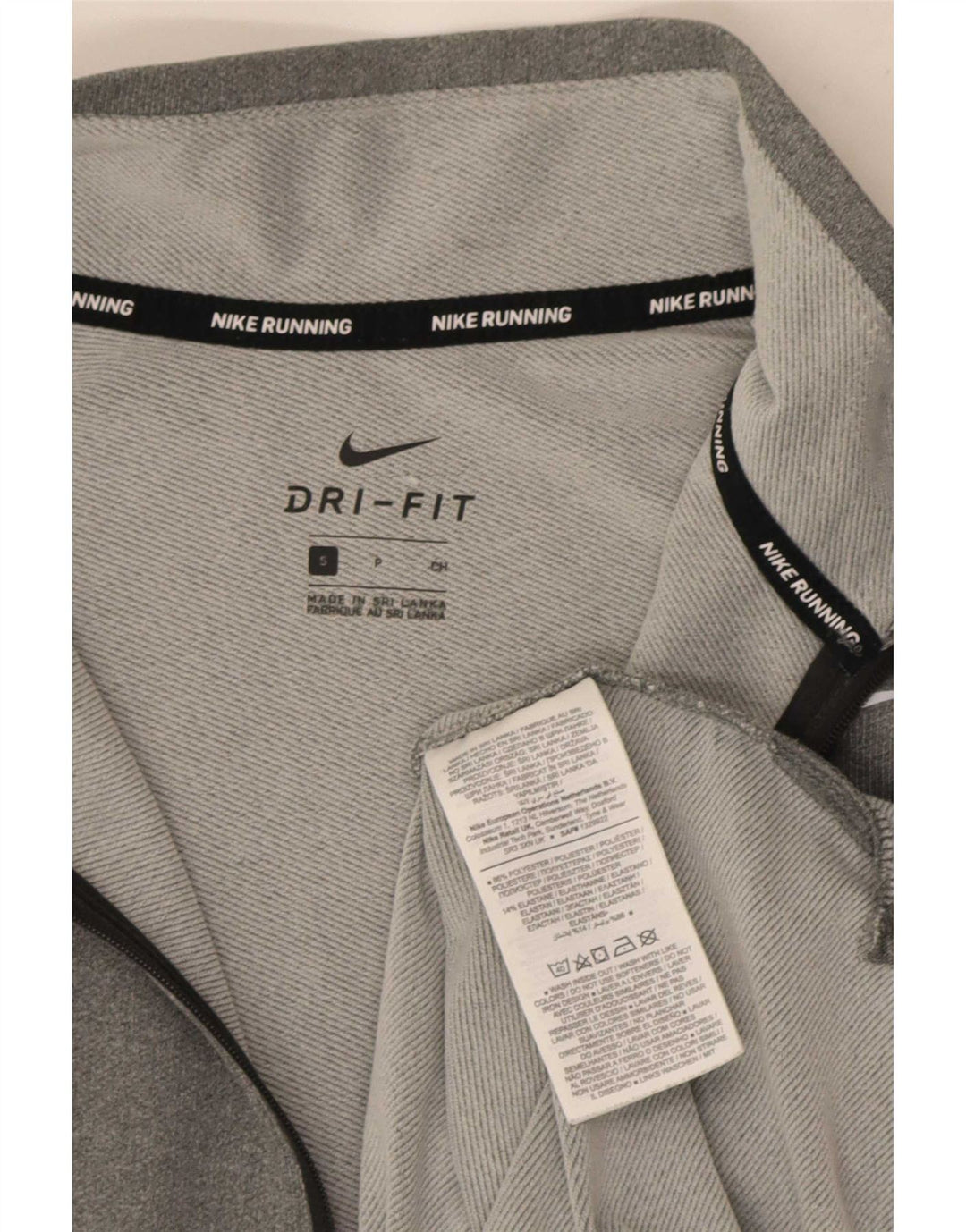 Nike Dri Fit majica s izrezom na patent i mali gornji dio trenirke od poliestera