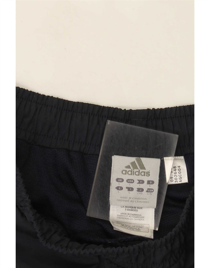 Adidas muške trenirke Hlače Joggers Veliki tamnoplavi prugasti poliester