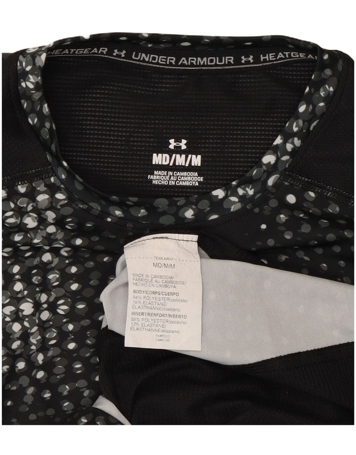 Under Armour ženska majica kratkih rukava s grafičkim motivima UK 12 srednji crni poliester
