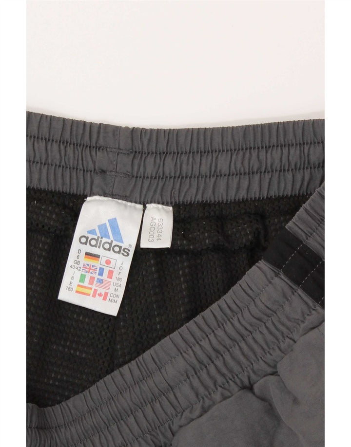 Adidas muške hlače za trenirku UK 40/42 srednje sive poliamidne boje