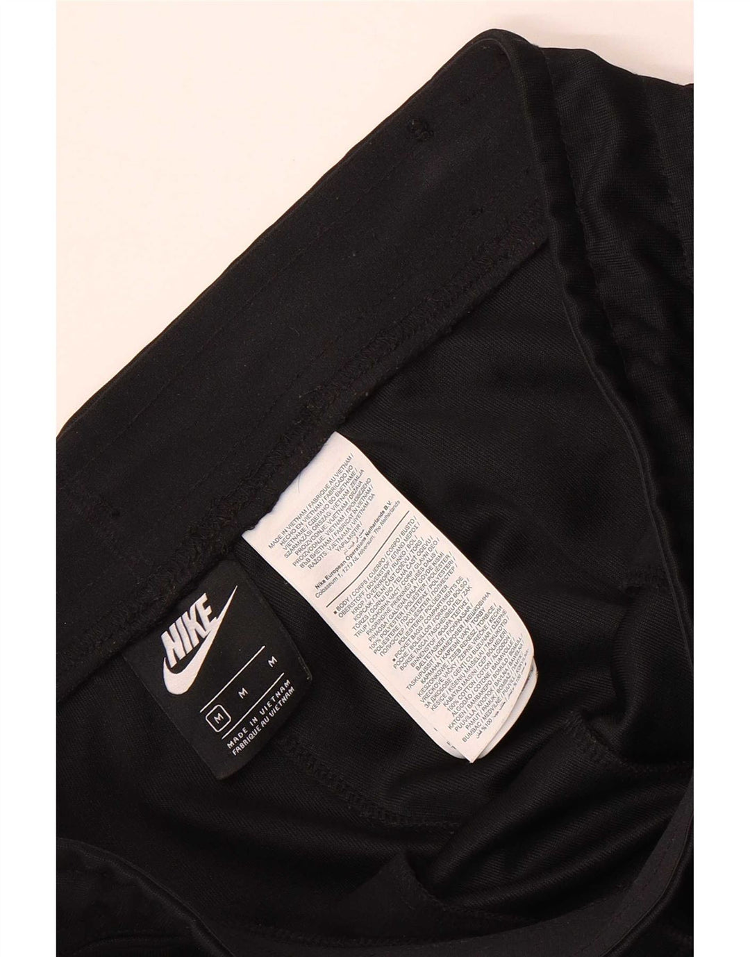 Nike muške grafičke trenirke, srednje hlače, crni poliester