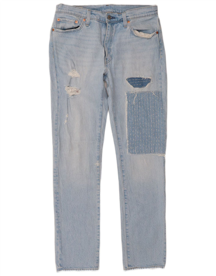 Levi's ženske 511 uske traperice s oštećenim izgledom W33 L32 plavi patchwork pamuk