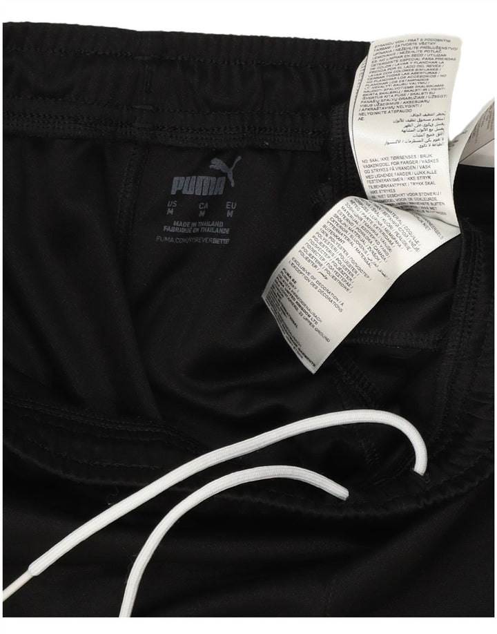 Puma Ženska trenirka Hlače Joggers UK 14 srednje crni poliester