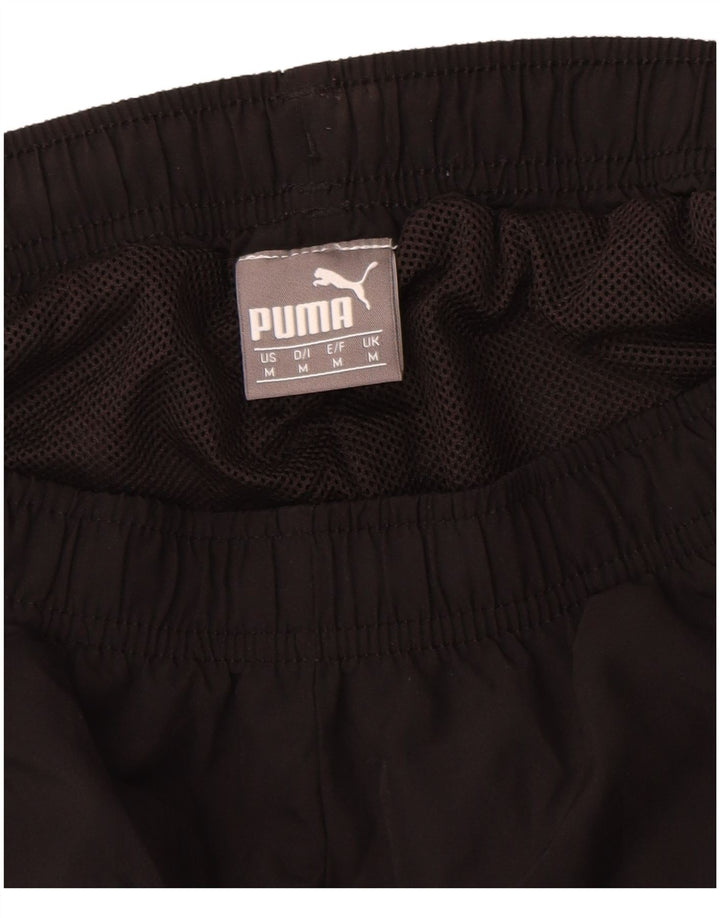 Puma muške grafičke trenirke, hlače za trčanje srednje crne boje od poliestera