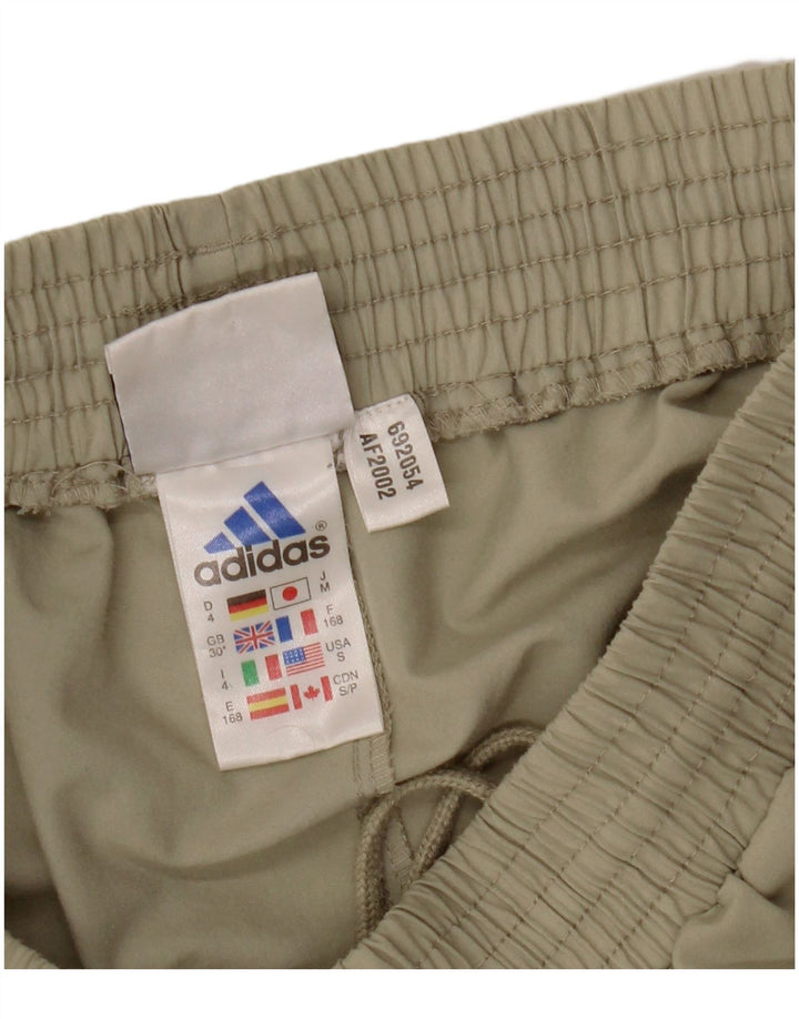 Adidas muške trenirke Hlače Joggers srednje zelene boje od poliestera