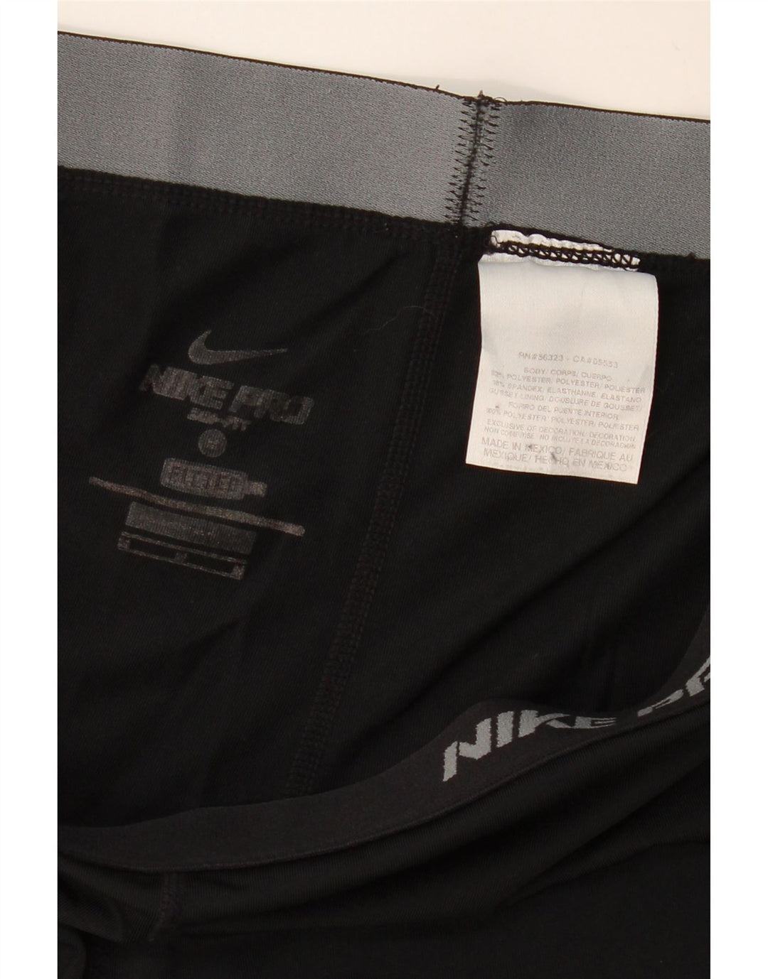 Ženske hlače za trenirku Nike Dri Fit UK 12 Srednji crni poliester
