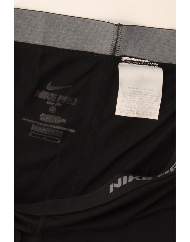 Ženske hlače za trenirku Nike Dri Fit UK 12 Srednji crni poliester