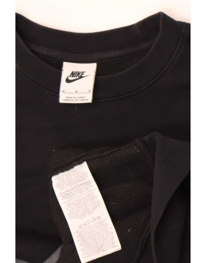 Nike muška trenirka s grafičkim motivima Srednji crni pamuk