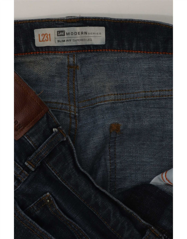 Muške sužene uske traperice Lee W36 L28 Plave