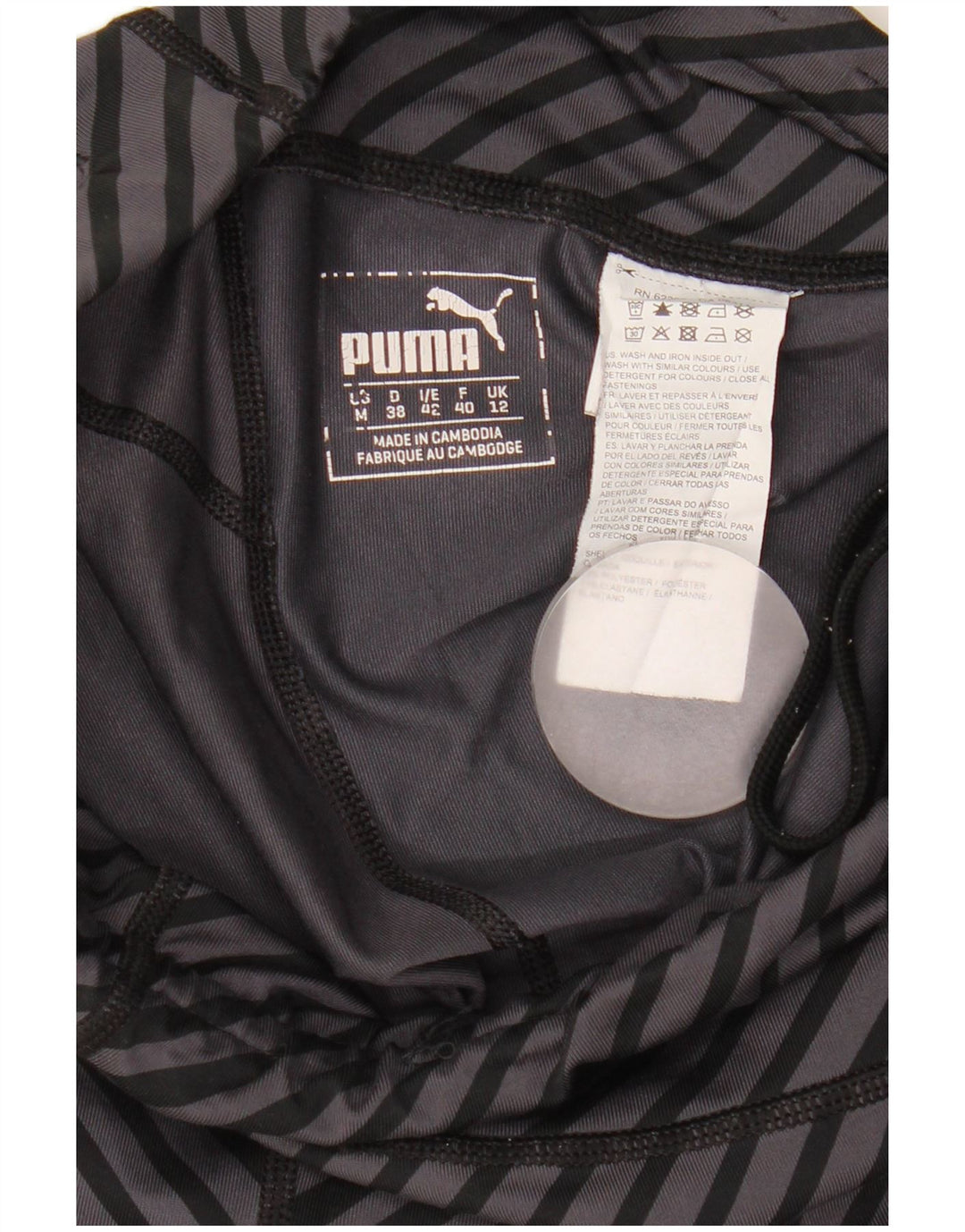 Puma ženske kapri tajice UK 12 srednje sivi prugasti poliester