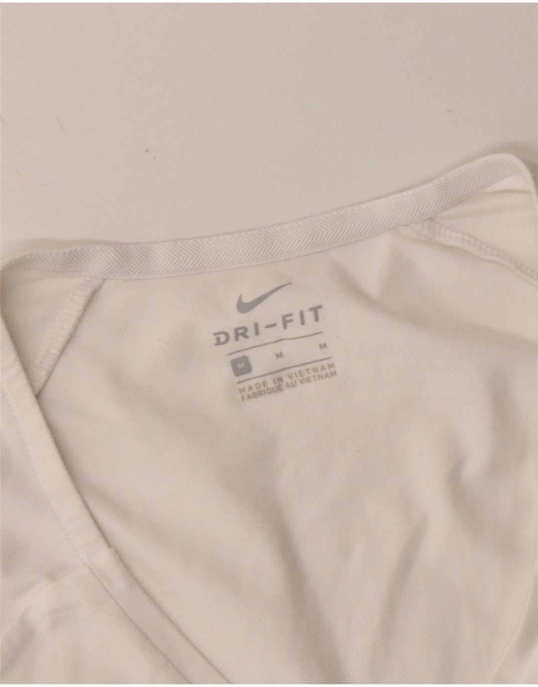 NIKE Womens Dri Fit Graphic T-Shirt Top UK 12 Medium White Vintage Nike and Second-Hand Nike from Messina Hembry 
