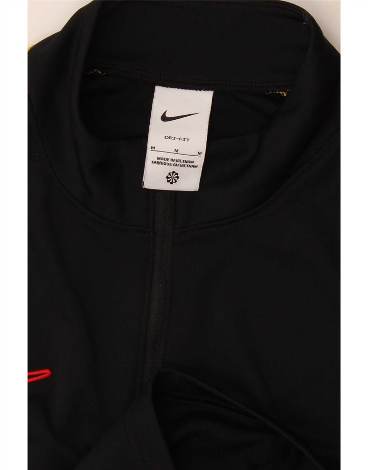 Nike Dri Fit majica s izrezom na patent i gornji dio trenirke srednje crne boje