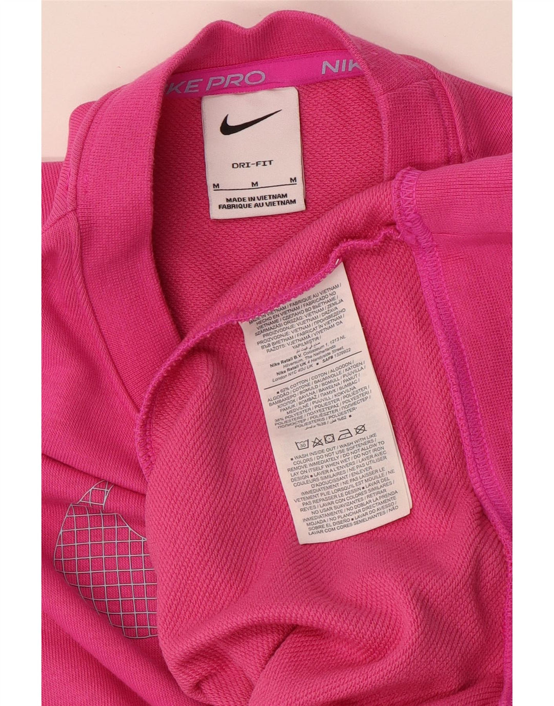 Nike Ženska prekomjerna trenirka s grafičkim motivima UK 14 Srednje ružičasti pamuk