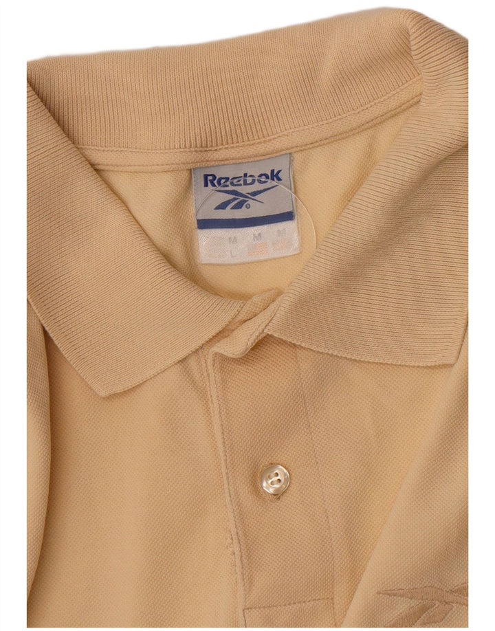 Reebok muška polo majica srednje bež boje