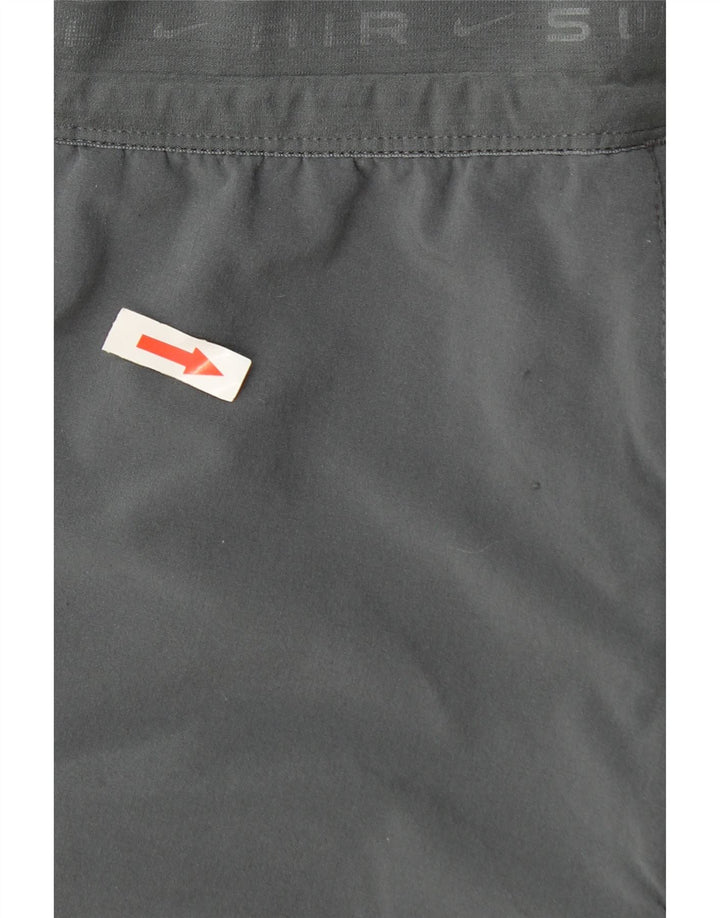 Nike muške Dri Fit hlače za trenirku Male sive poliesterske