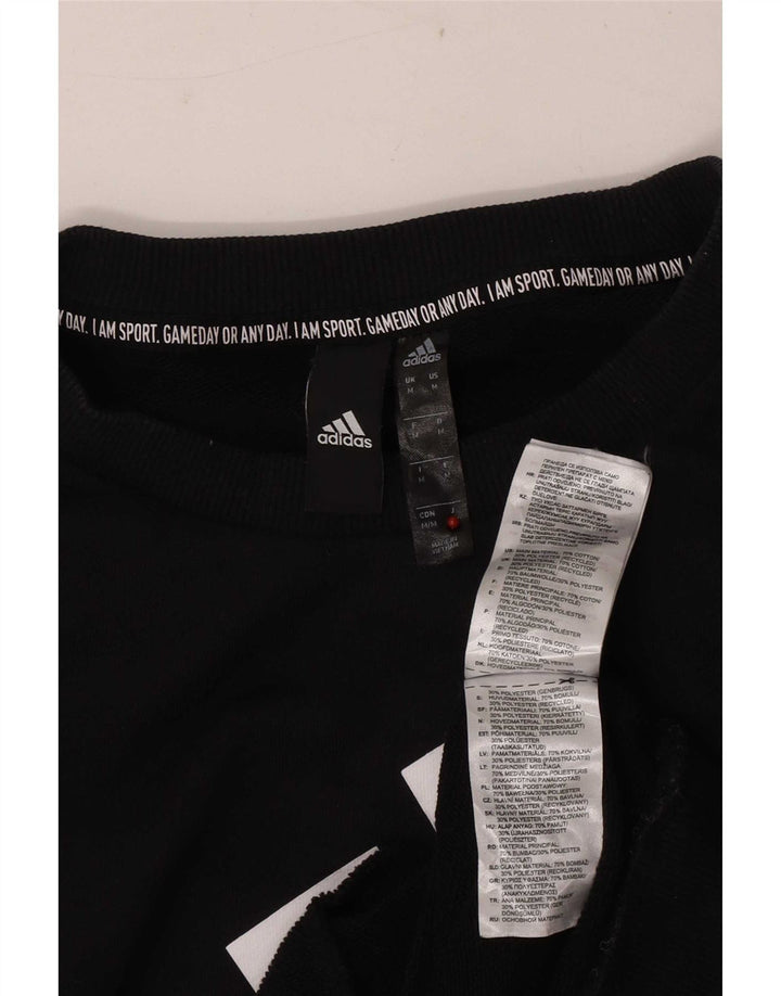 Adidas muška trenirka s grafičkim motivima Srednji crni pamuk