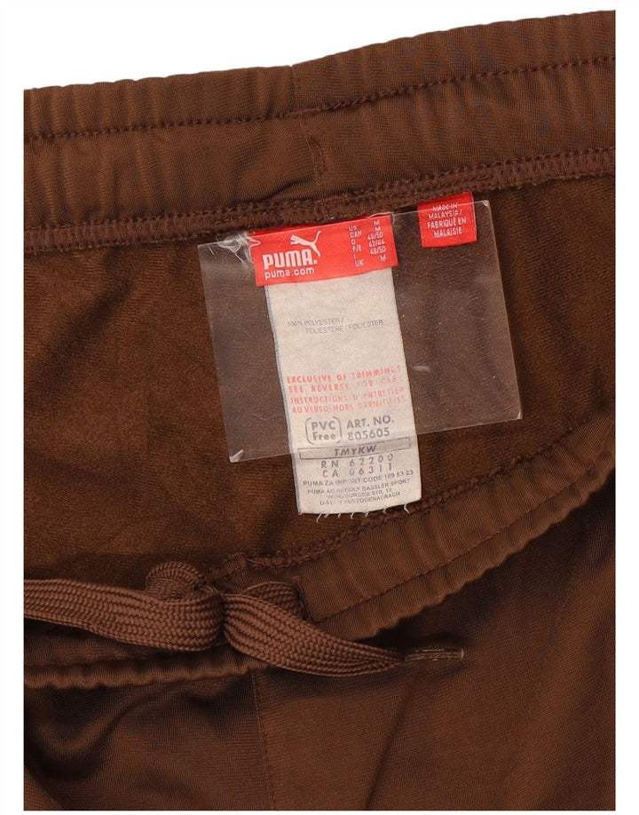 PUMA ženske hlače za trenirku UK 12 srednje smeđe poliesterske boje