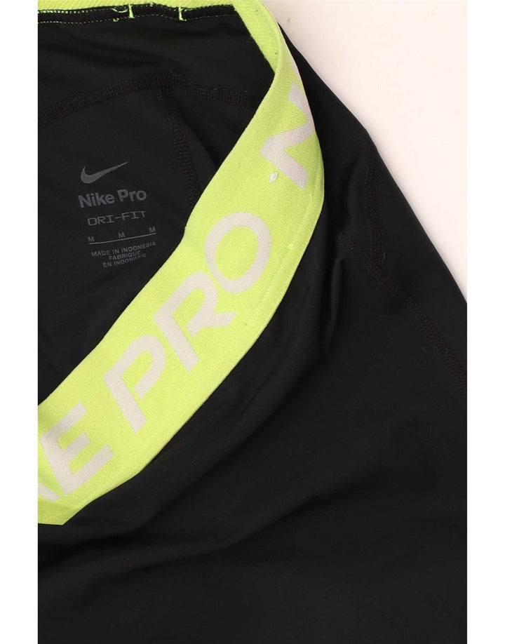 Nike ženske Dri Fit tajice UK 12 srednje crne