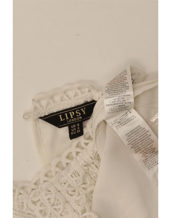 Top ženske bluze Lipsy UK 6 XS bijeli poliester s cvjetnim uzorkom