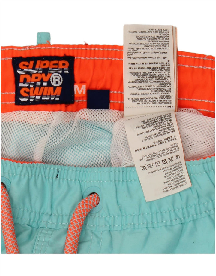 Superdry muške kratke hlače za kupanje s grafičkim motivima srednje plavi poliester