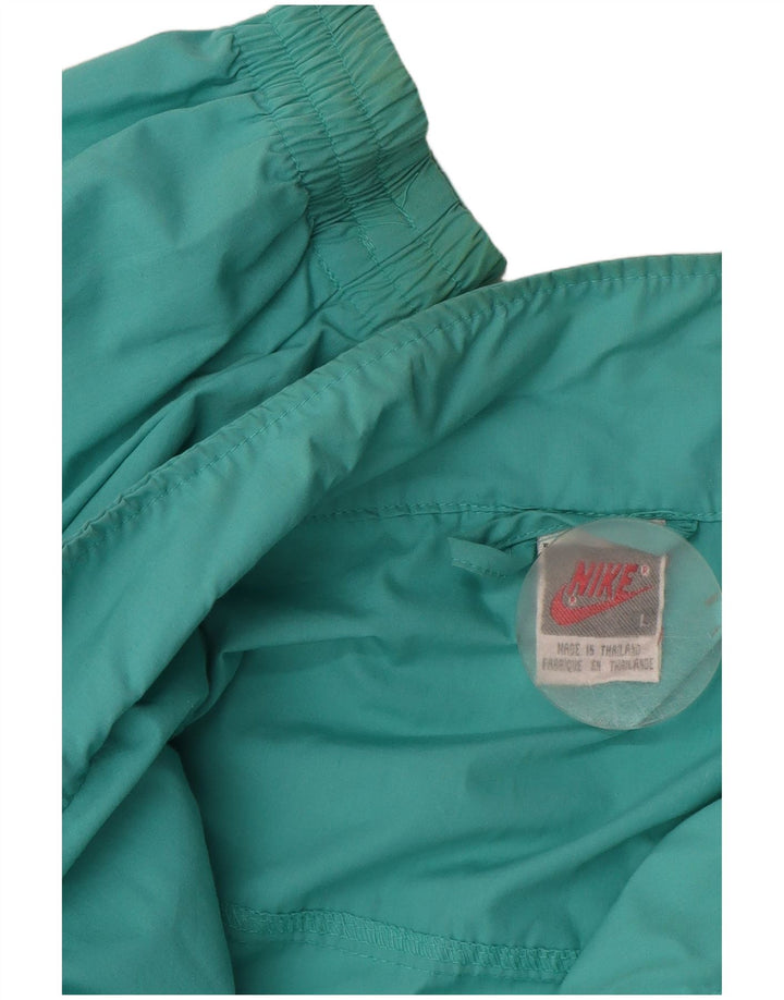 Nike muška puna trenirka velika tirkizna poliesterska