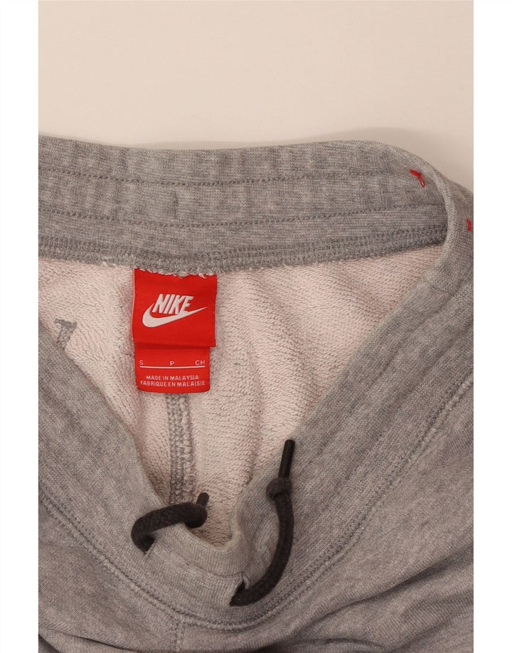 NIKE Ženska trenirka Hlače Joggers UK 10 male sive