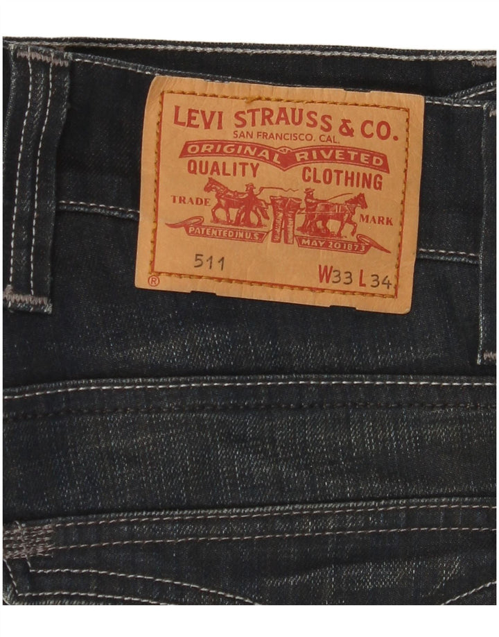 LEVI'S muške 511 uske traperice W33 L34 tamnoplavi pamuk