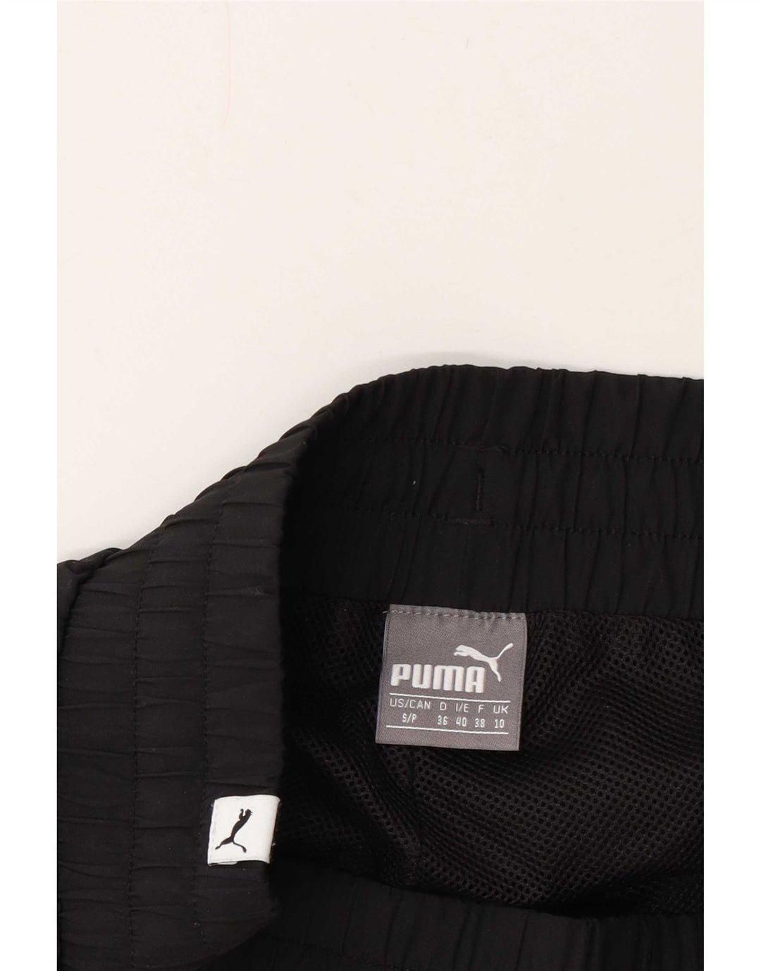 Puma ženske Capri trenirke UK 10 male crne