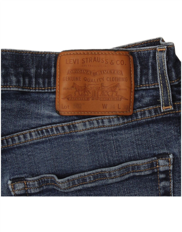 Levi's muške 502 sužene traperice W34 L30 plave