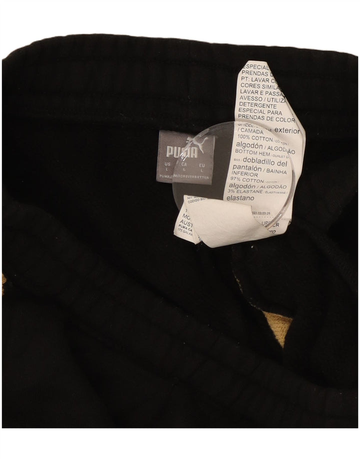 PUMA Ženska trenirka Hlače Joggers UK 14 Veliki crni životinjski print