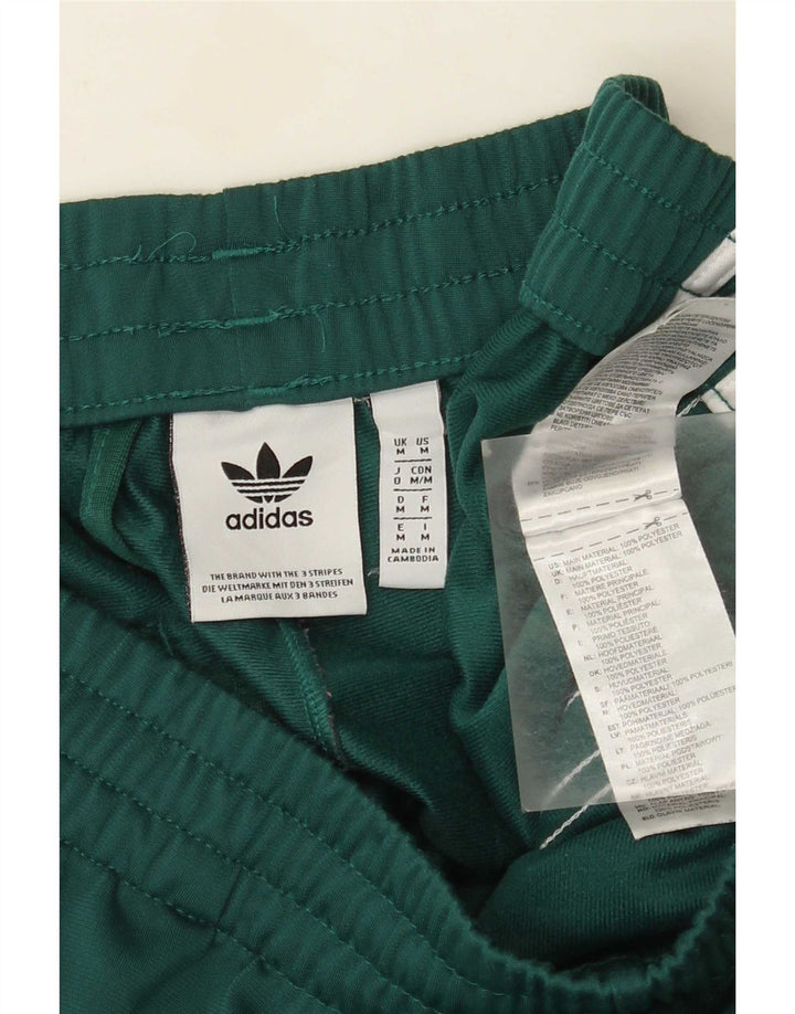Adidas muške hlače od trenirke srednje zelene boje od poliestera