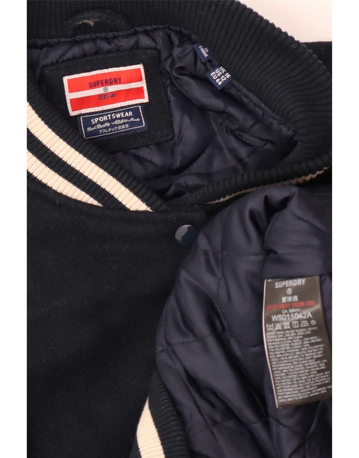 Superdry ženska prevelika sveučilišna jakna UK 16 Veliki tamnoplavi blok boja