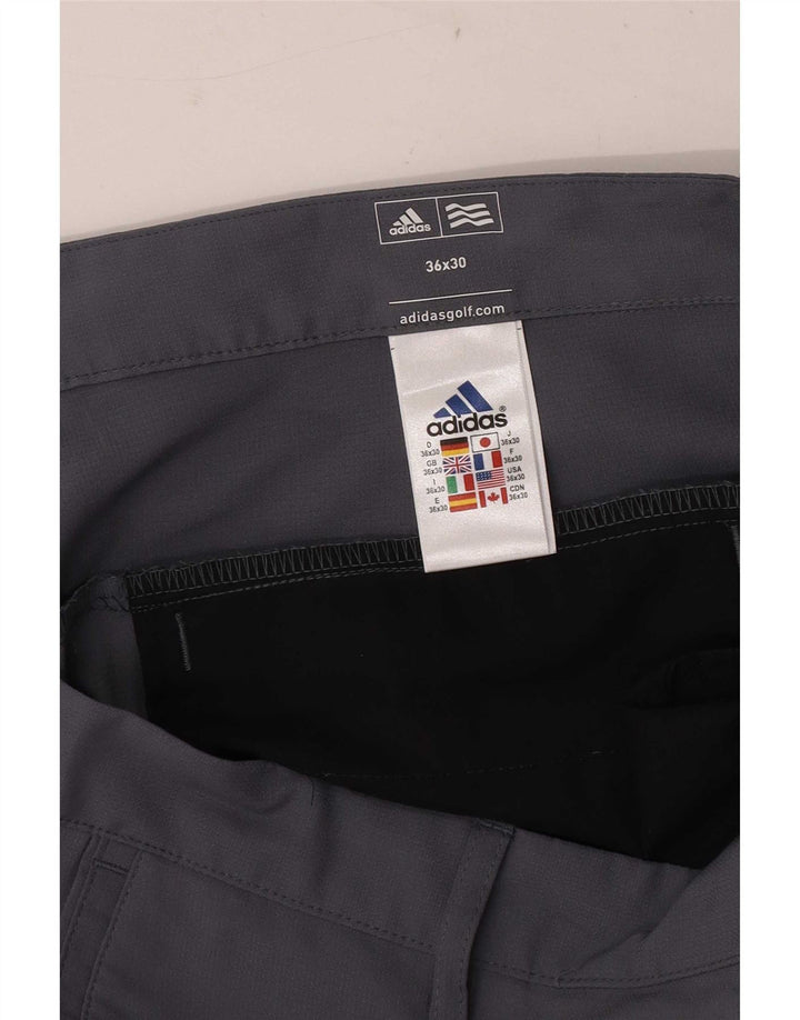 Adidas muške golf ravne chino hlače W36 L30 sivi poliester