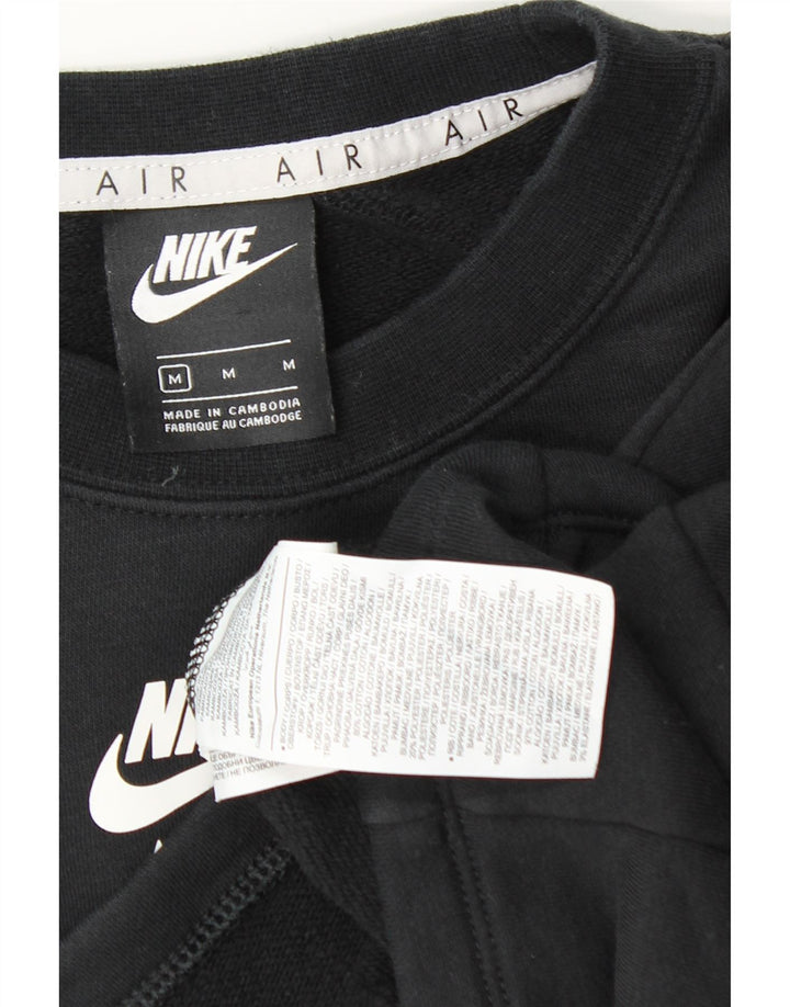 Nike ženska prekomjerna majica s grafičkim motivima UK 14 srednje crna