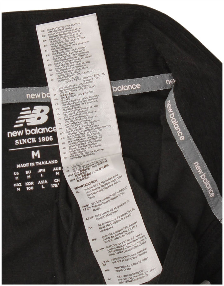 New Balance gornji dio muške trenirke s patentnim izrezom srednje crne boje