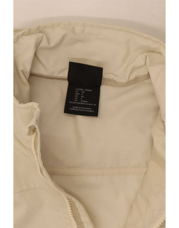 Jack Wolfskin ženska kišna jakna s kapuljačom UK 6 XS Off bijeli poliester