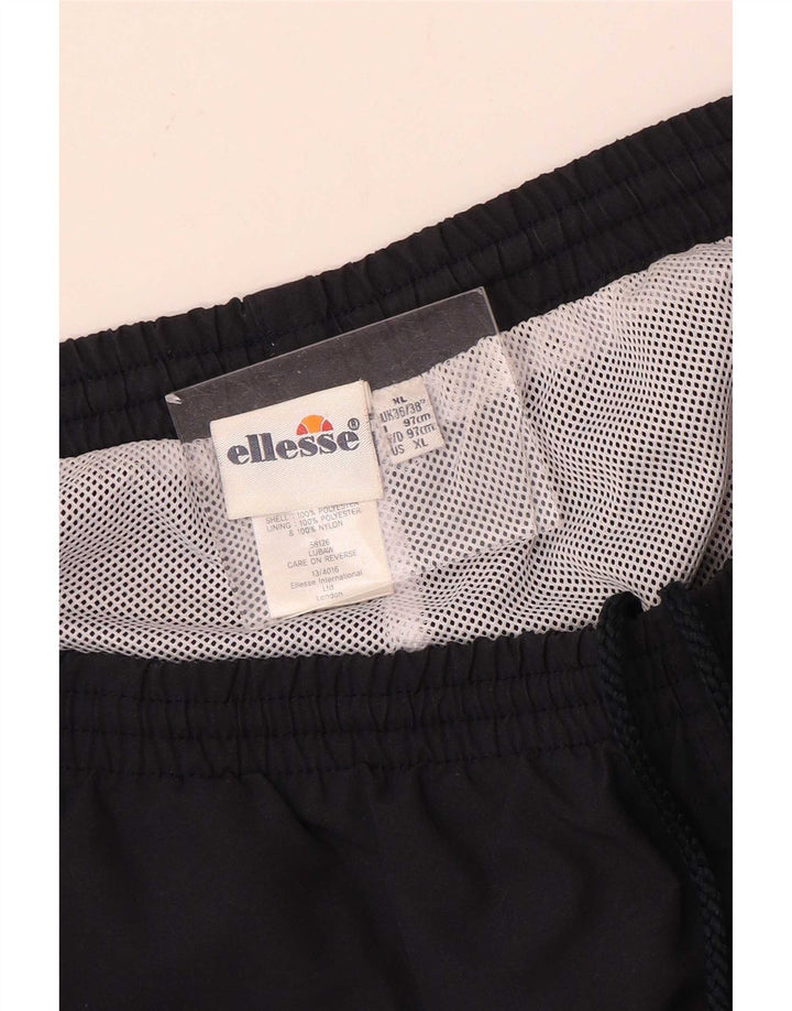 Ellesse muške trenirke Hlače XL tamnoplavi poliester