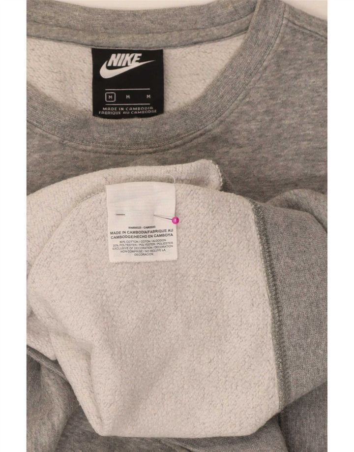 Nike muška trenirka s grafikom Regular Fit srednje sivi pamuk