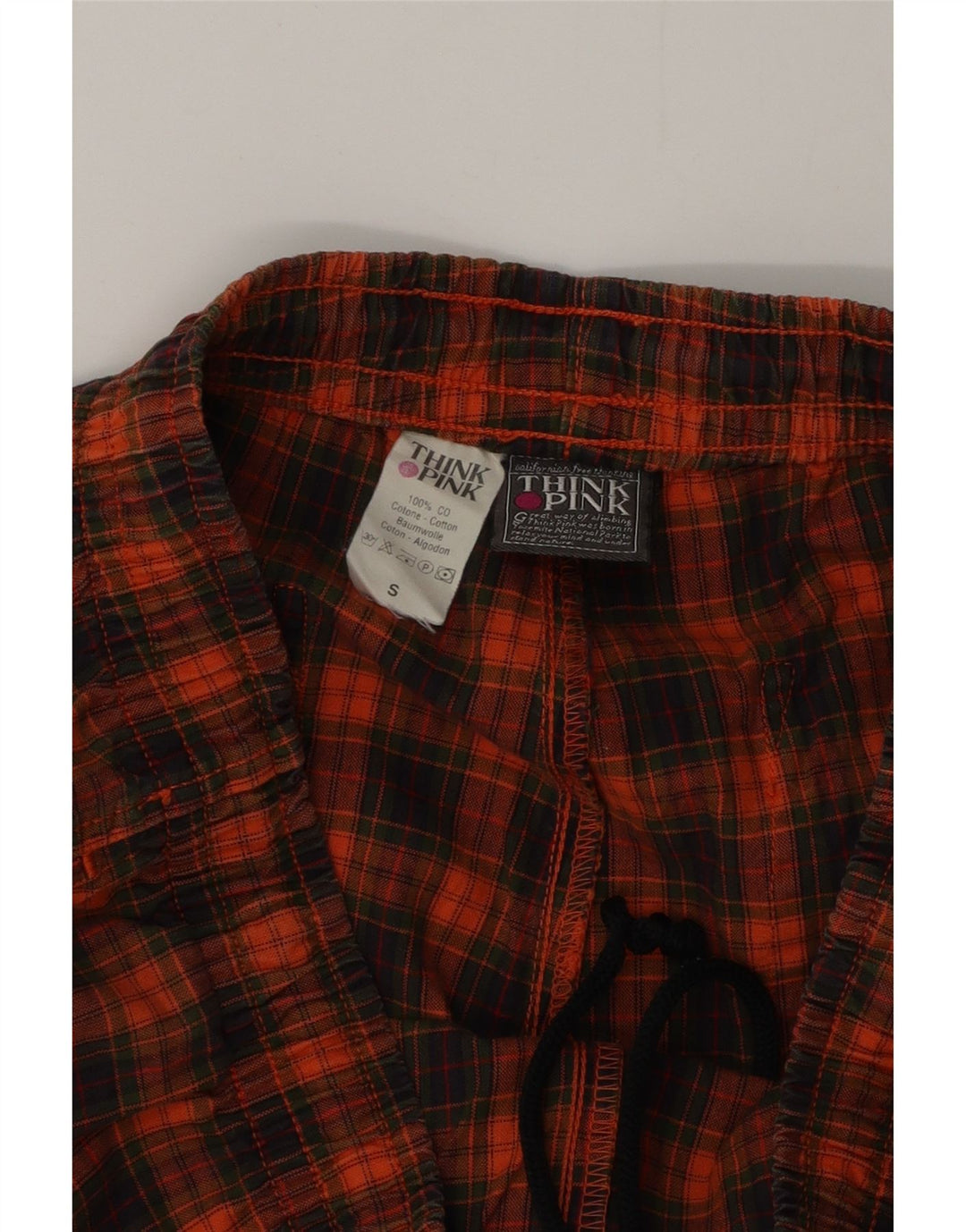 Razmislite o ružičastim muškim grafičkim trenirkama, malim narančastim kariranim pamučnim hlačama