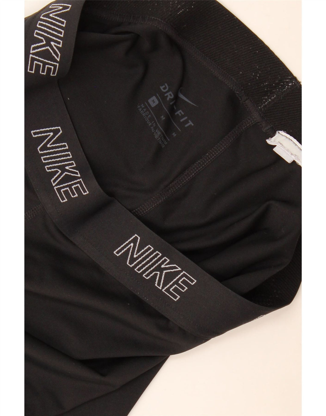 Nike Ženske Dri Fit Graphic Capri tajice UK 12 srednje crne