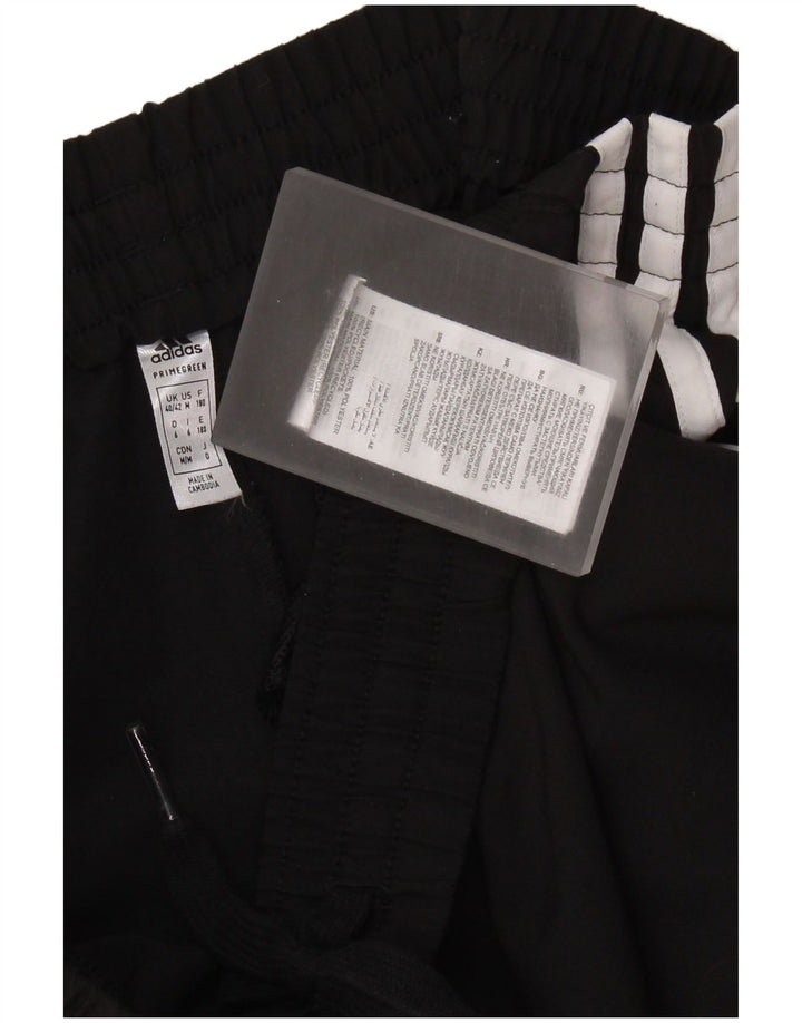 ADIDAS muške trenirke Hlače Joggers UK 40/42 srednje crni poliester