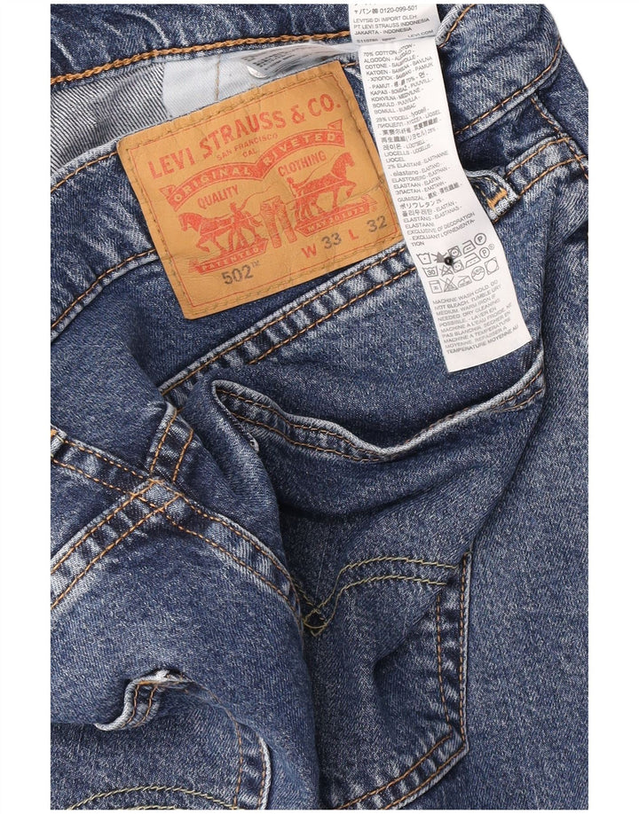 Levi's muške 502 sužene traperice W33 L29 plavi pamuk