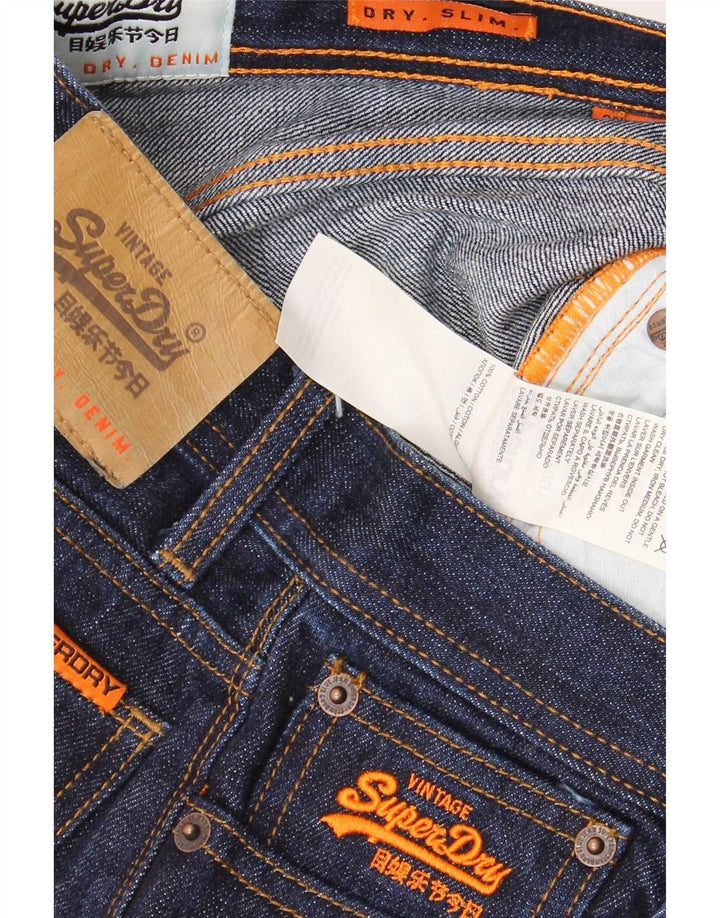 Superdry ženske uske traperice W28 L30 tamnoplavi pamuk